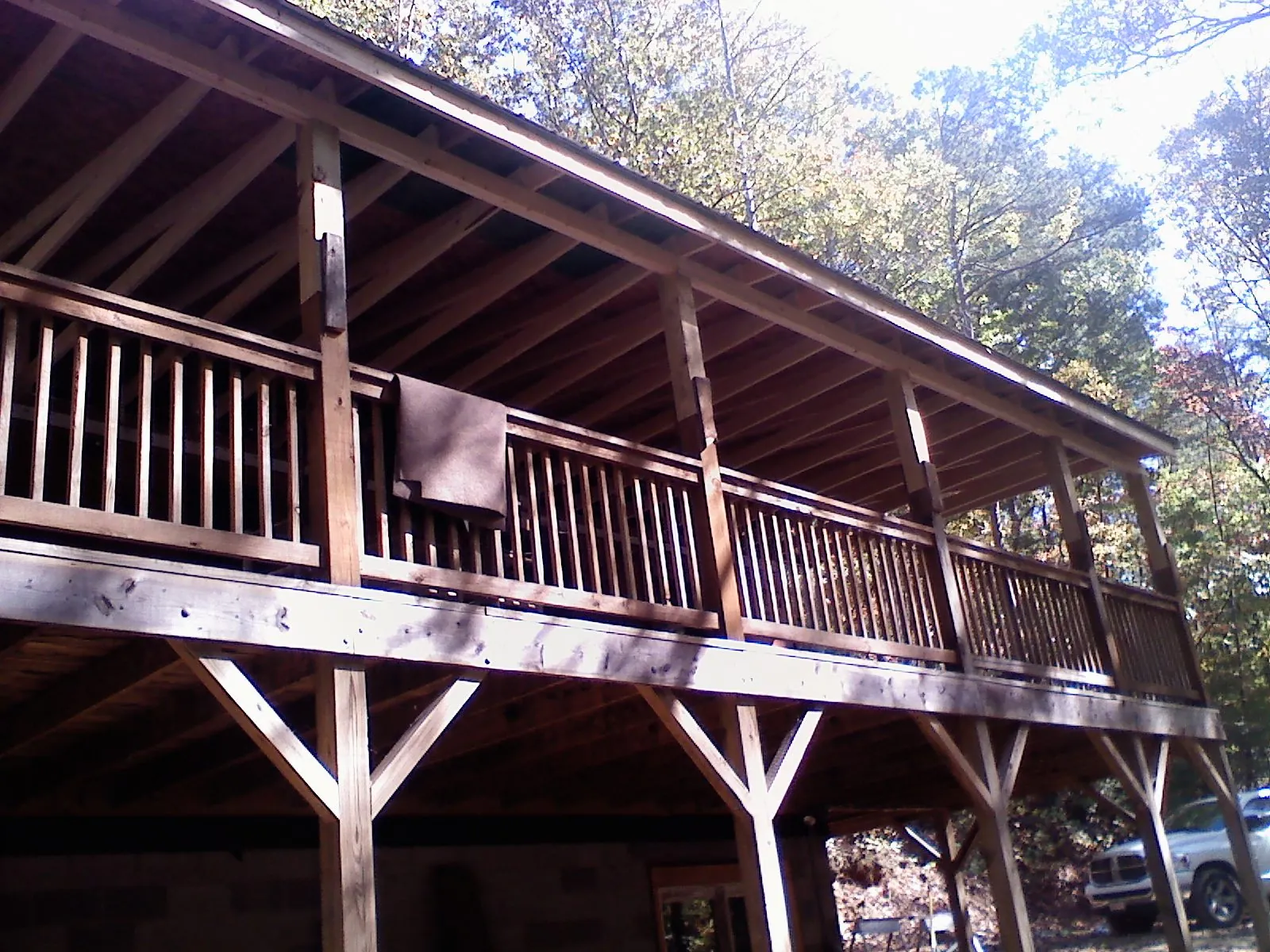 Timber framing under a new elevated porch and deck — Roof Leak Repair in Billerica by Roofing Brothers